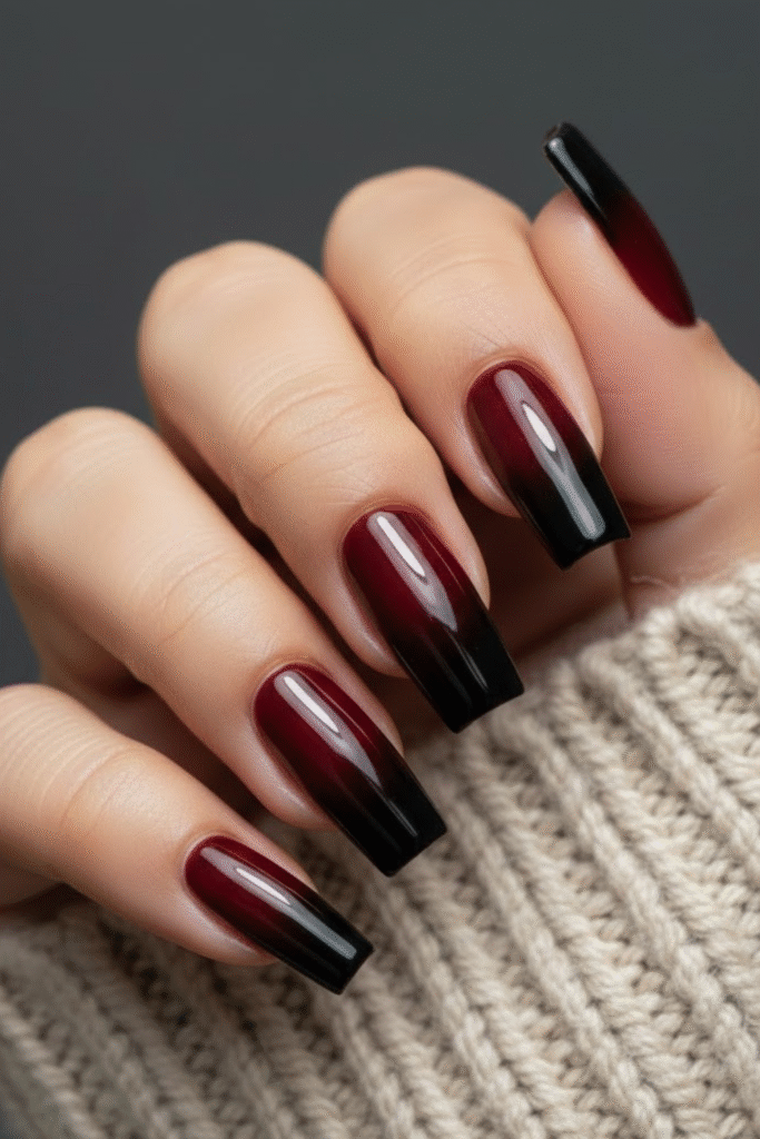 Aura nails in diffused plum, espresso, and olive tones with soft glow gradient effect
